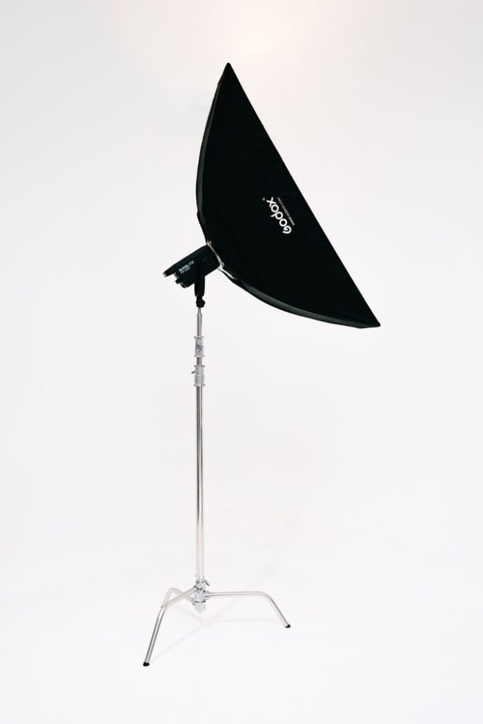 Black softbox on a metal stand for professional studio photography.
